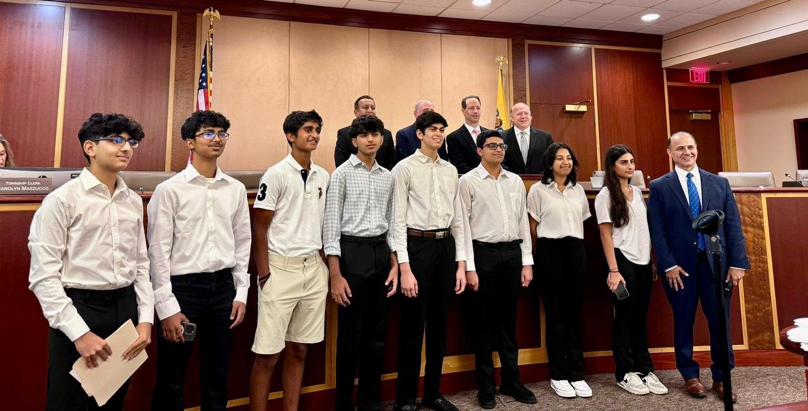 Livingston Youth Leaders members standing together at a Livingston Township Council meeting