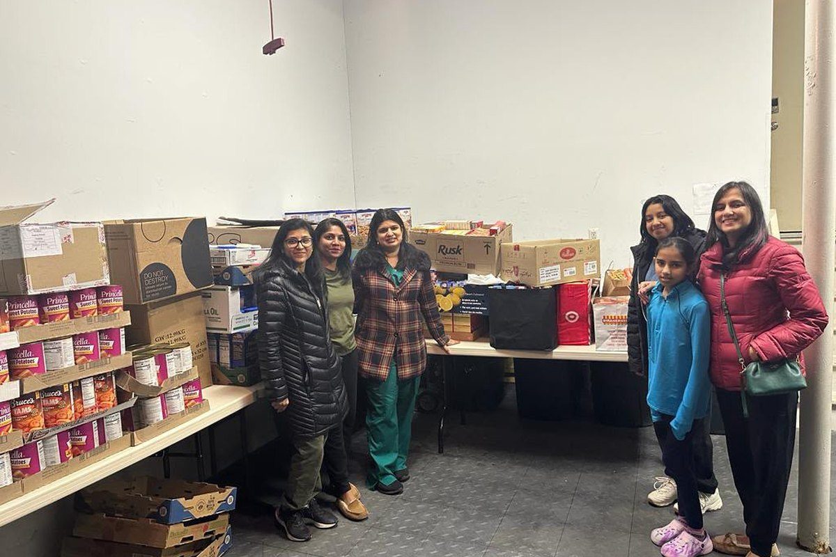 Volunteers with the collected food at the pantry
